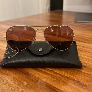 Ray Ban aviator sunglasses with violet lenses